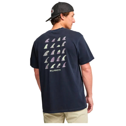 Person wearing a navy blue t-shirt with surfboard fin design and 'Billabong' logo on the back.