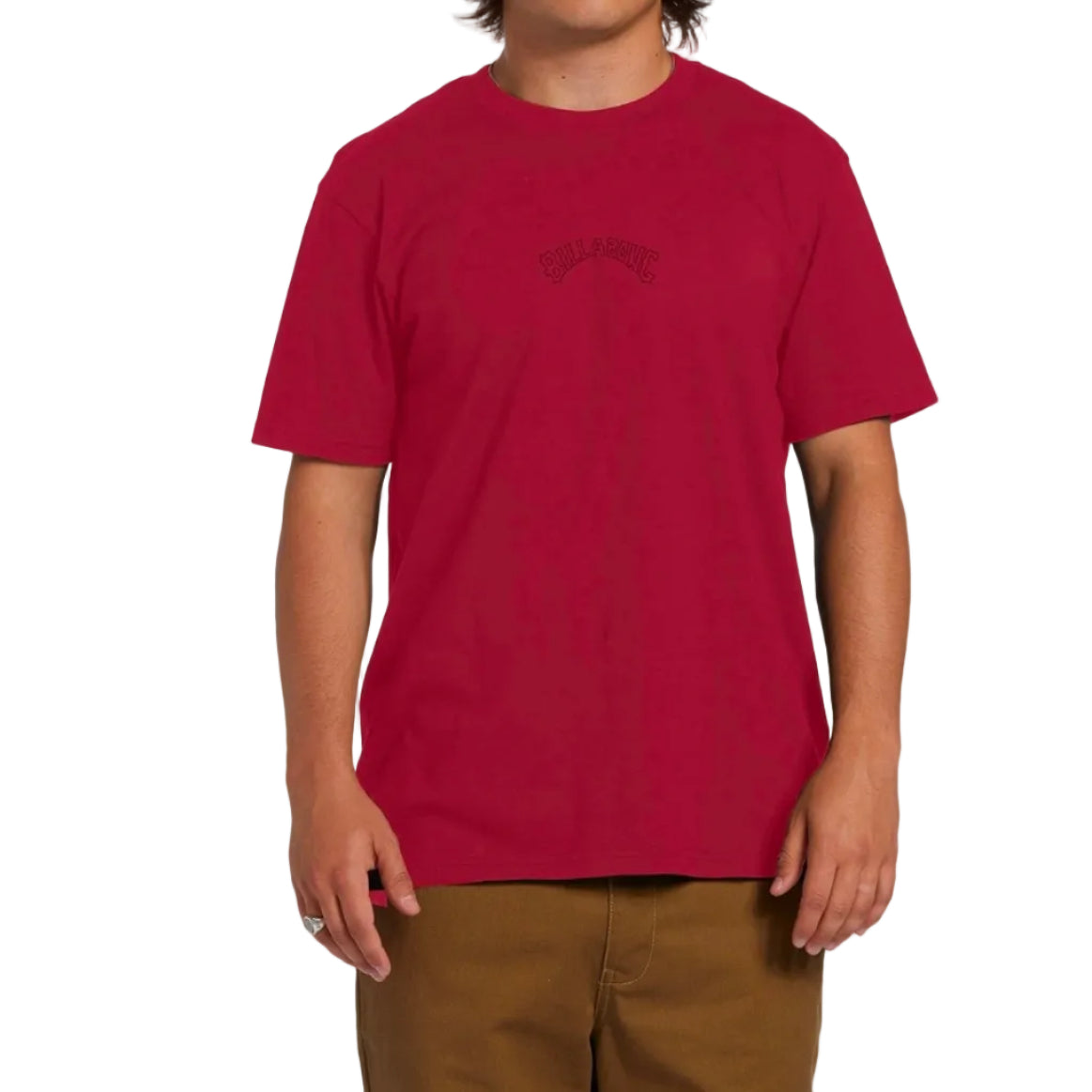 Person wearing a red t-shirt with text on a white background