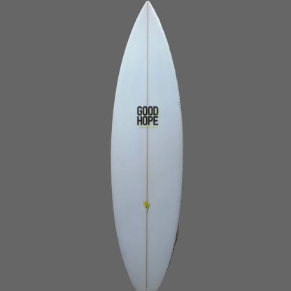 White surfboard with 'Good Hope' branding against a woven mat background