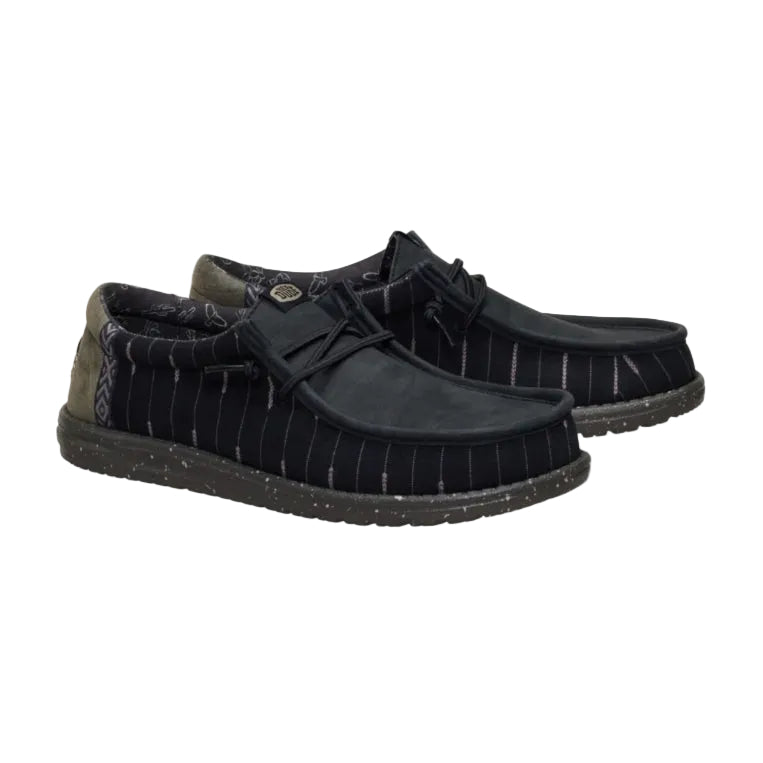 Black pinstripe shoes on a white background