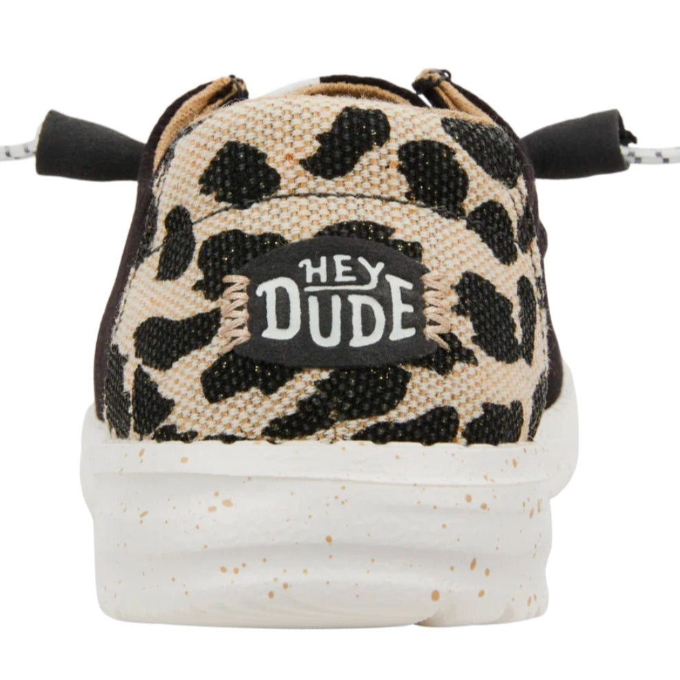 Leopard print sneaker with 'Hey Dude' label on a white background