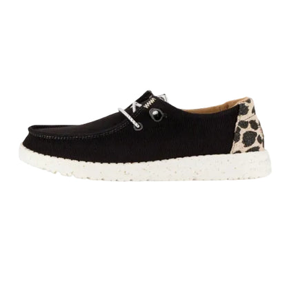 Black casual shoe with leopard print heel on a white background