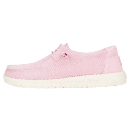 Pink sneaker with white sole on a white background