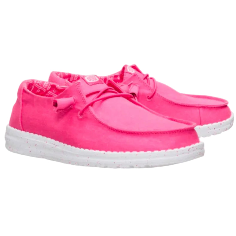 Pink sneakers with white soles on a white background