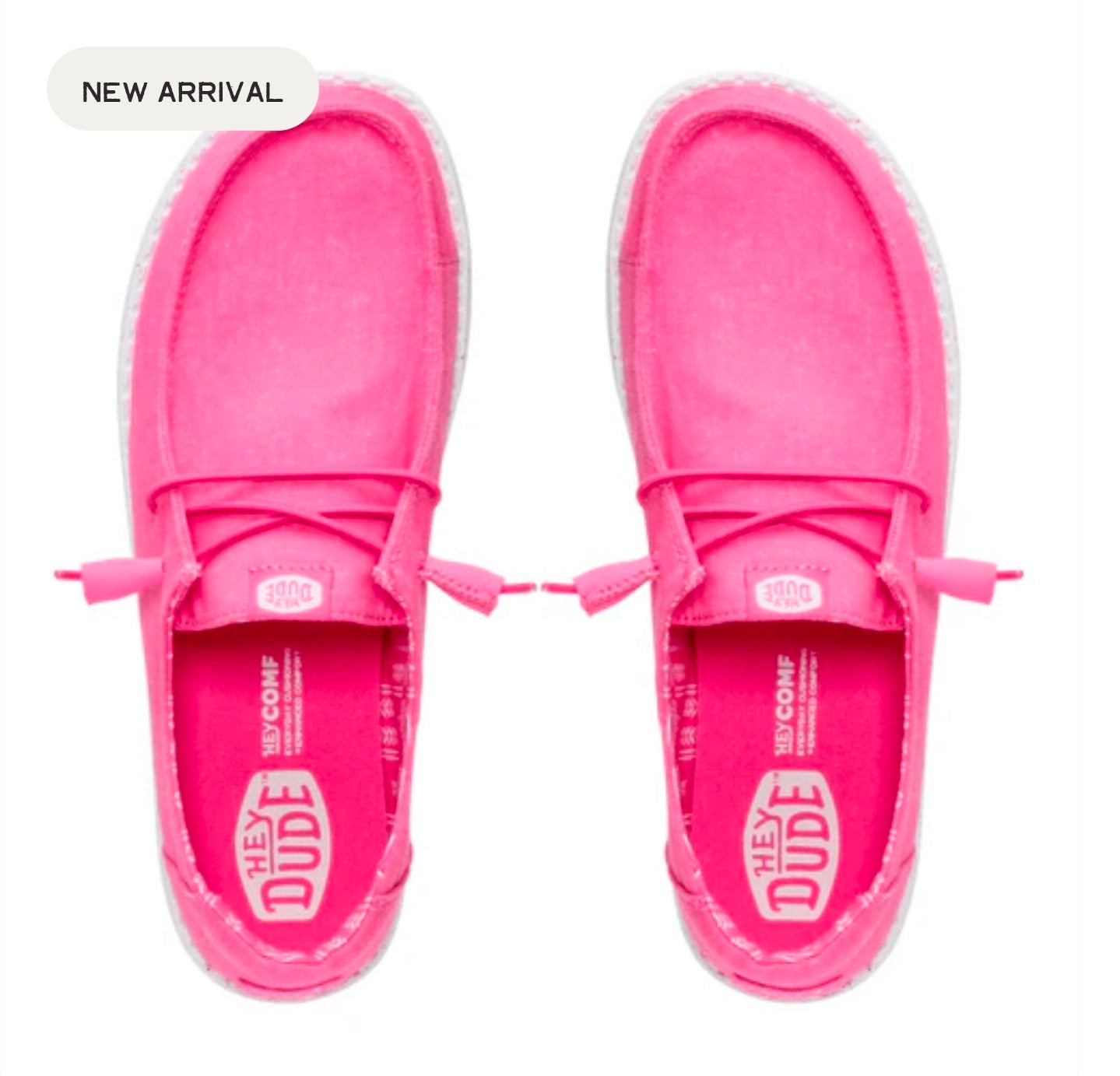 Pink slip-on shoes with 'The Dude' branding on a white background