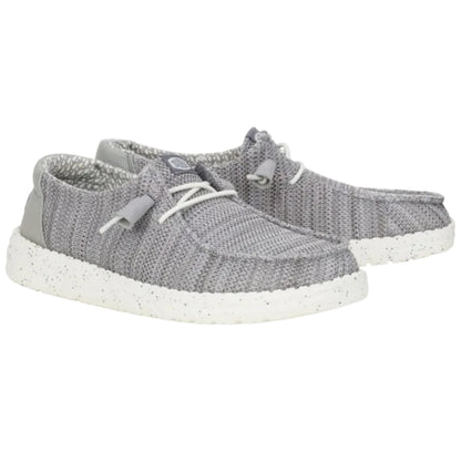 Gray sneakers with white soles on a white background