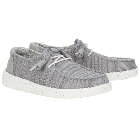 Gray sneakers with white soles on a white background