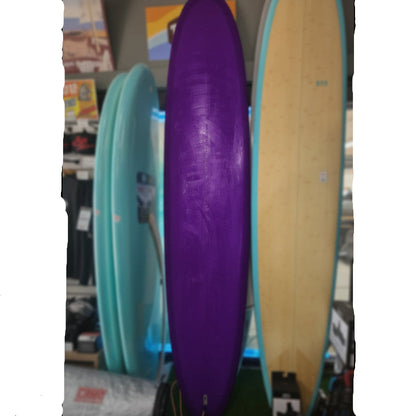 Purple surfboard with teal and yellow boards in a store setting