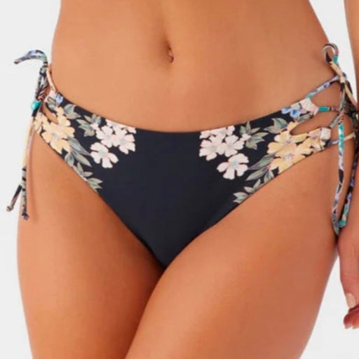Woman wearing a floral bikini set on a white background