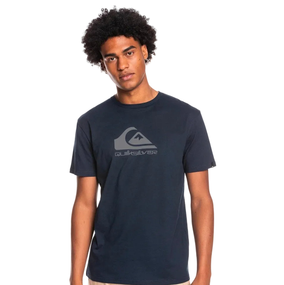 Person wearing a Quiksilver t-shirt on a white background