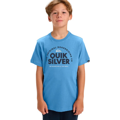 Child wearing a blue Quiksilver t-shirt on a white background