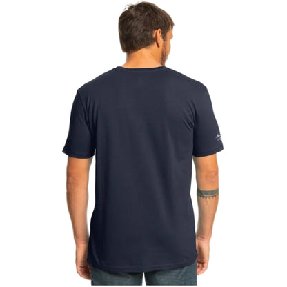 Man wearing a navy blue t-shirt with a visible brand logo on the back.