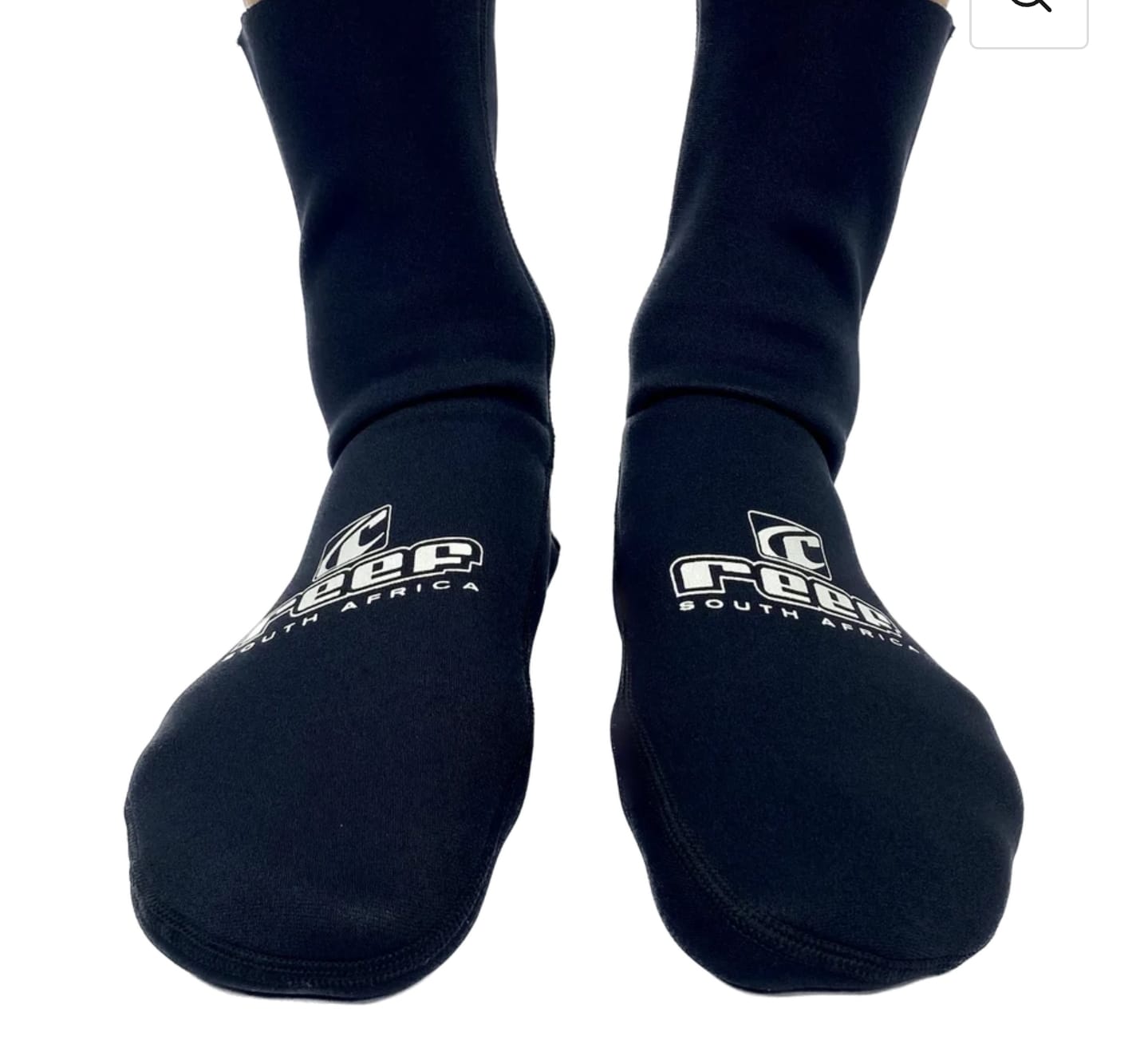 Black socks with a logo on the feet against a white background