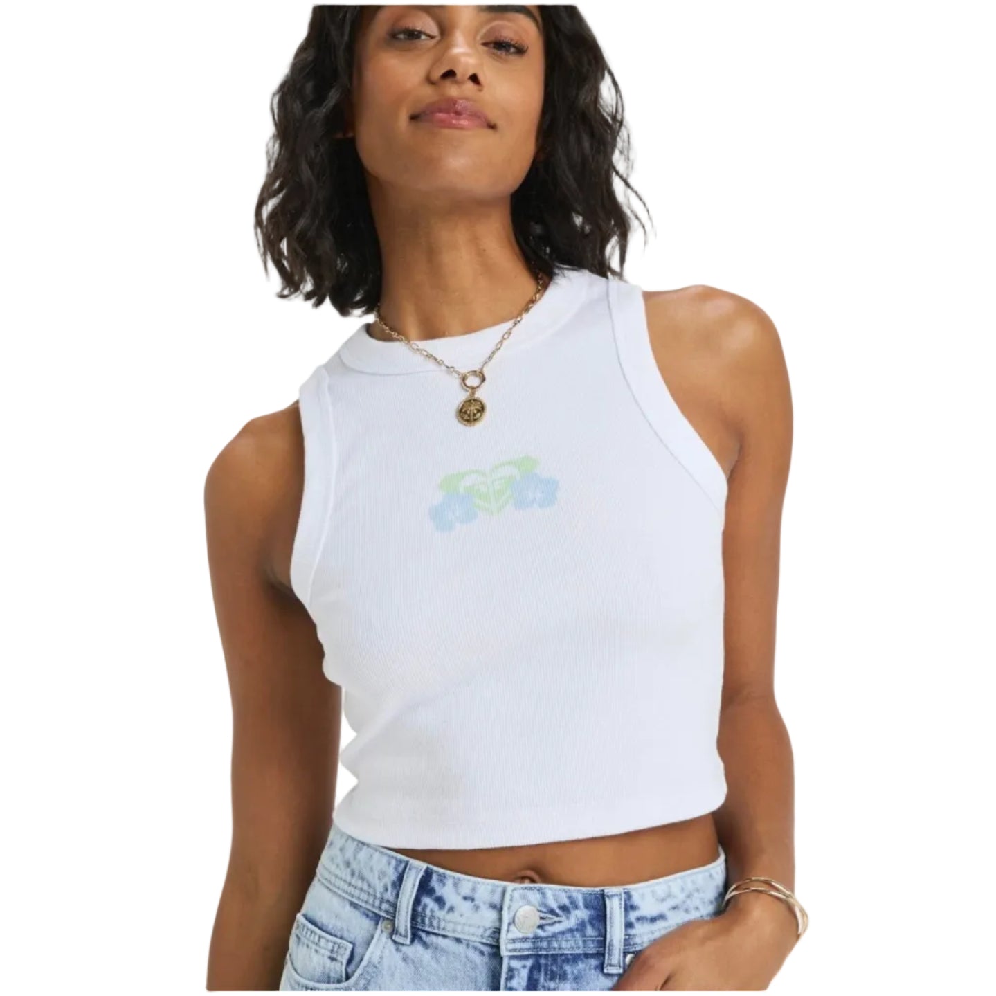 Woman wearing a white sleeveless top with a small design on a plain background