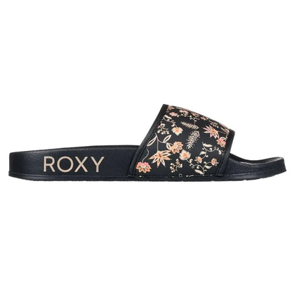 Black slide sandal with floral design and 'ROXY' branding on a white background