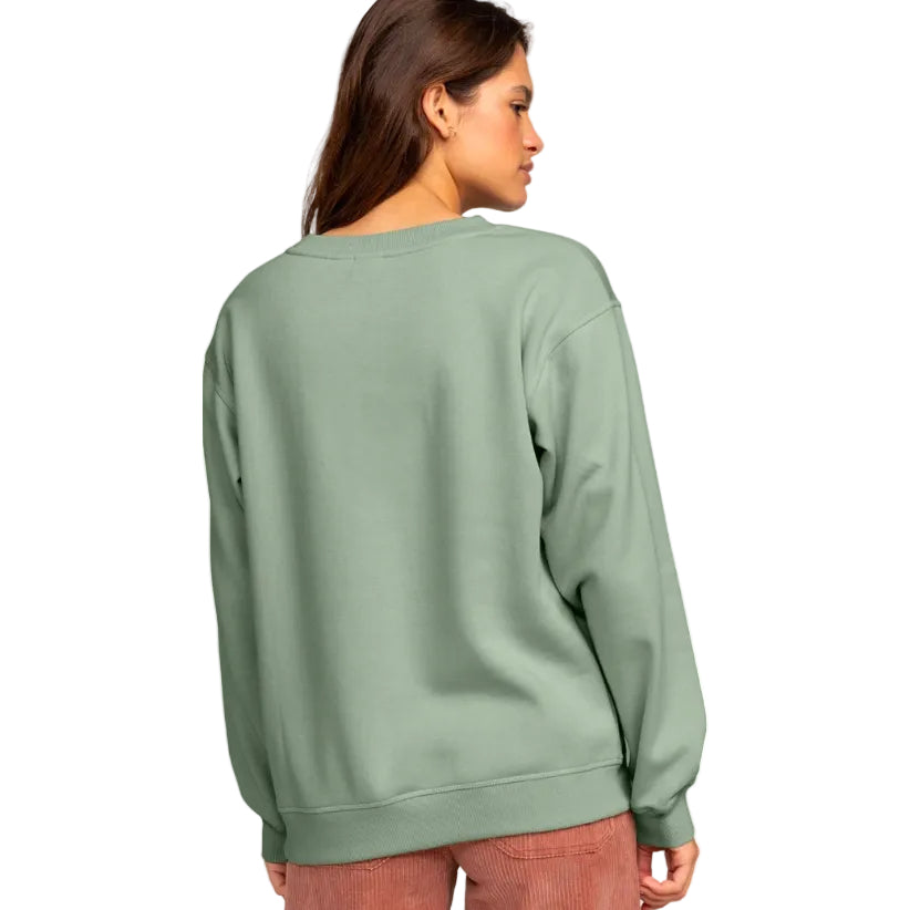 Person wearing a green sweatshirt on a white background